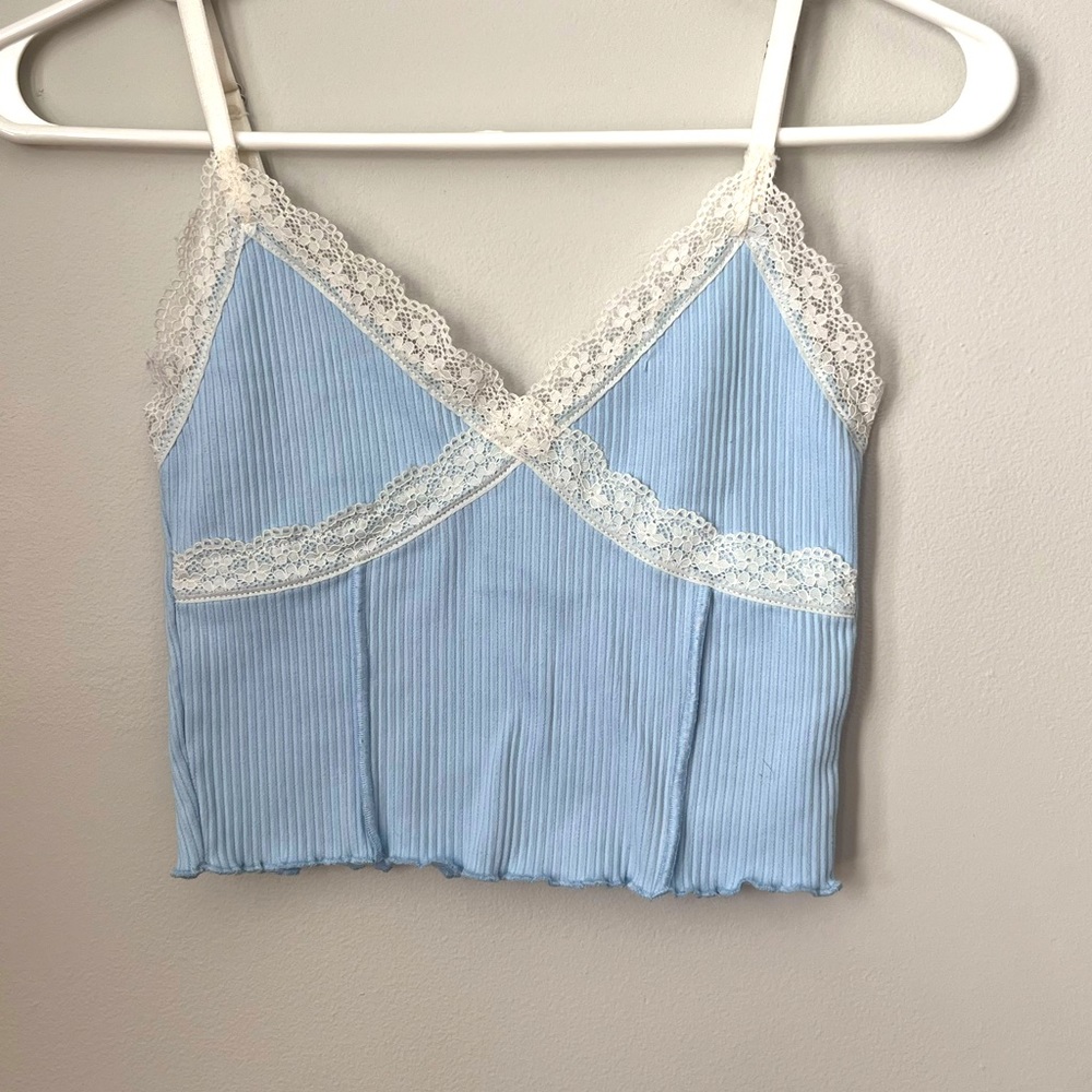 Light blue cropped tank top.